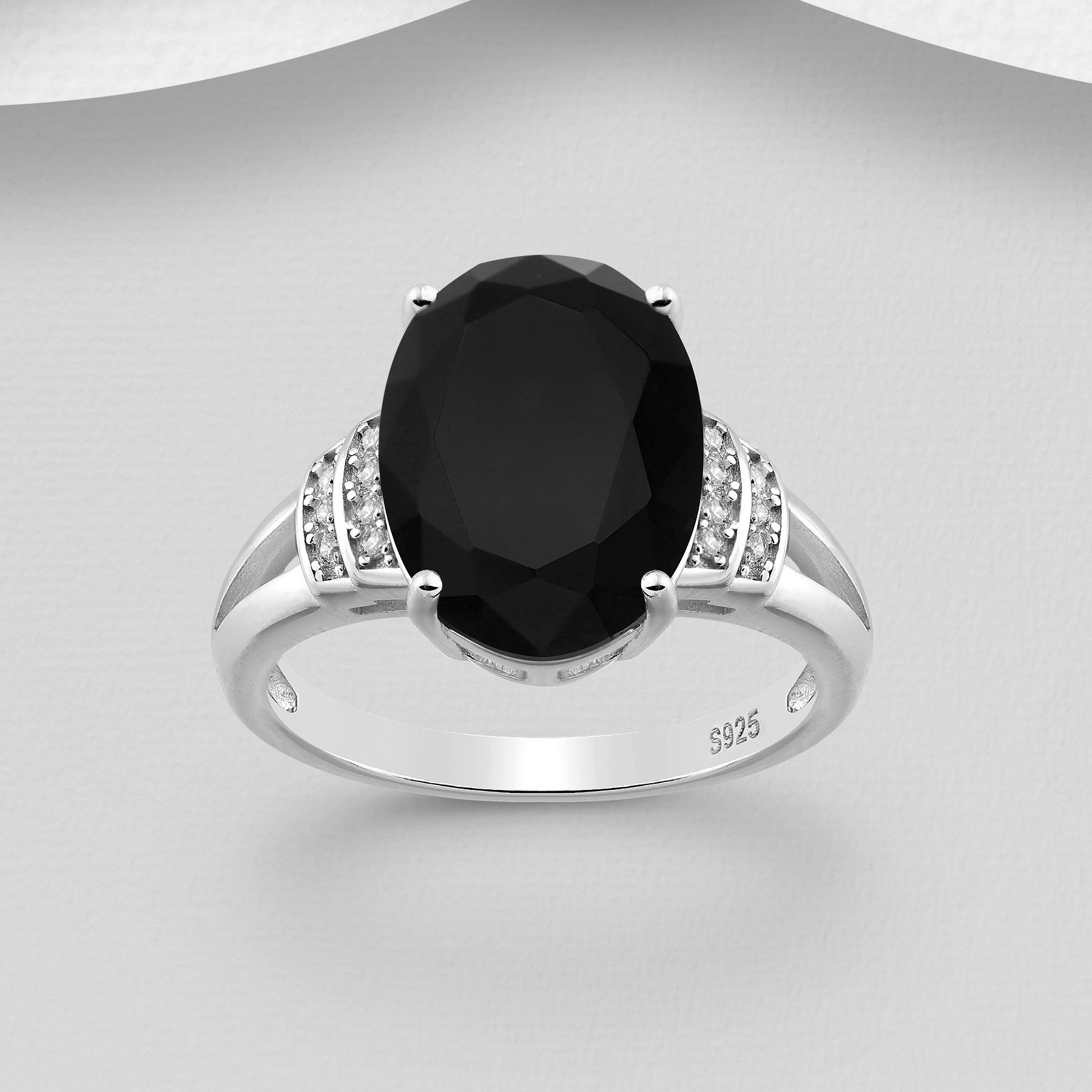 925 Sterling Silver Oval Ring Decorated with CZ Simulated DiamondsItem ...